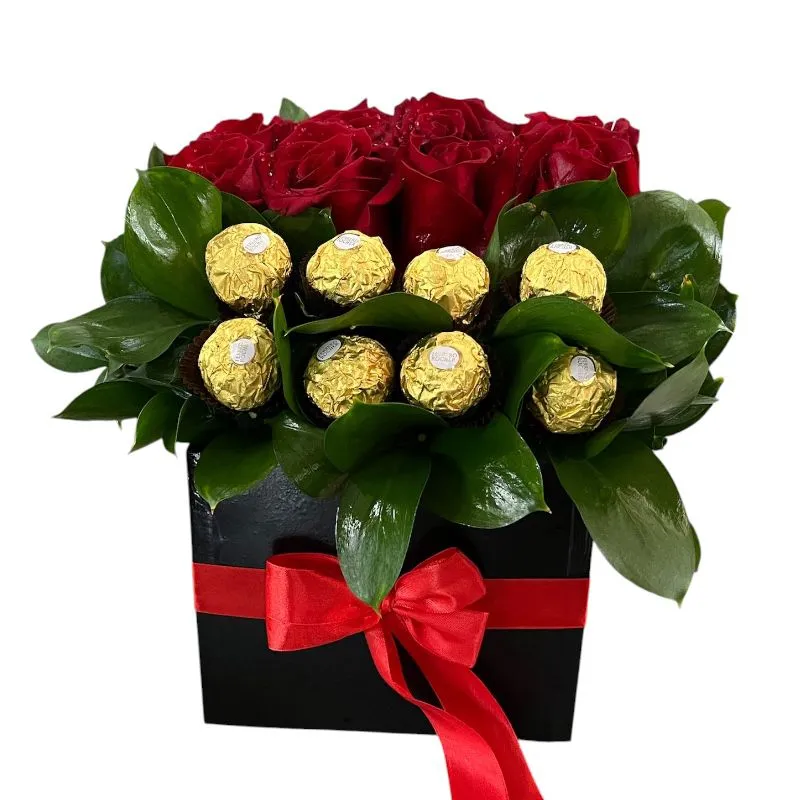 Arreglo floral para el Día de Amor y Amistad en Cali con rosas rojas, chocolates y globos a domicilio.
